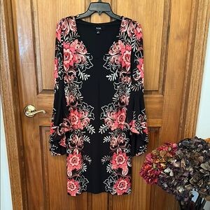 Black Floral Dress flower accents dynamic sleeves